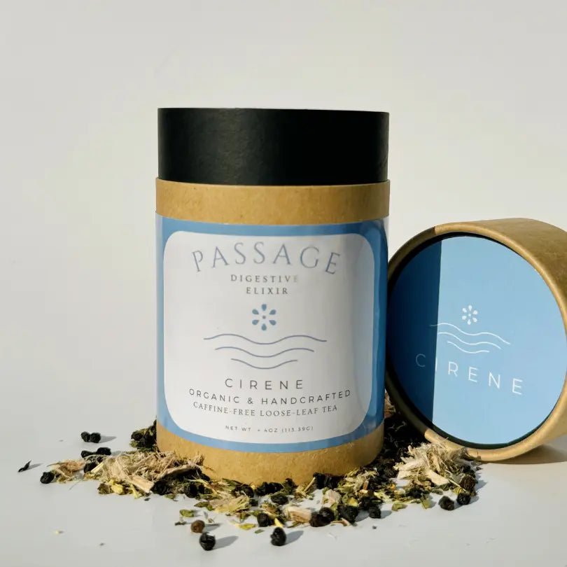 Passage by CIRENE is an organic, handcrafted, caffeine-free loose leaf tea designed to support digestion. Packaged in an eco-friendly container with minimalist blue and white labels, this tea blend embodies wellness and natural purity.